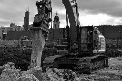 chicago area demolition project, with chicago skyline in background